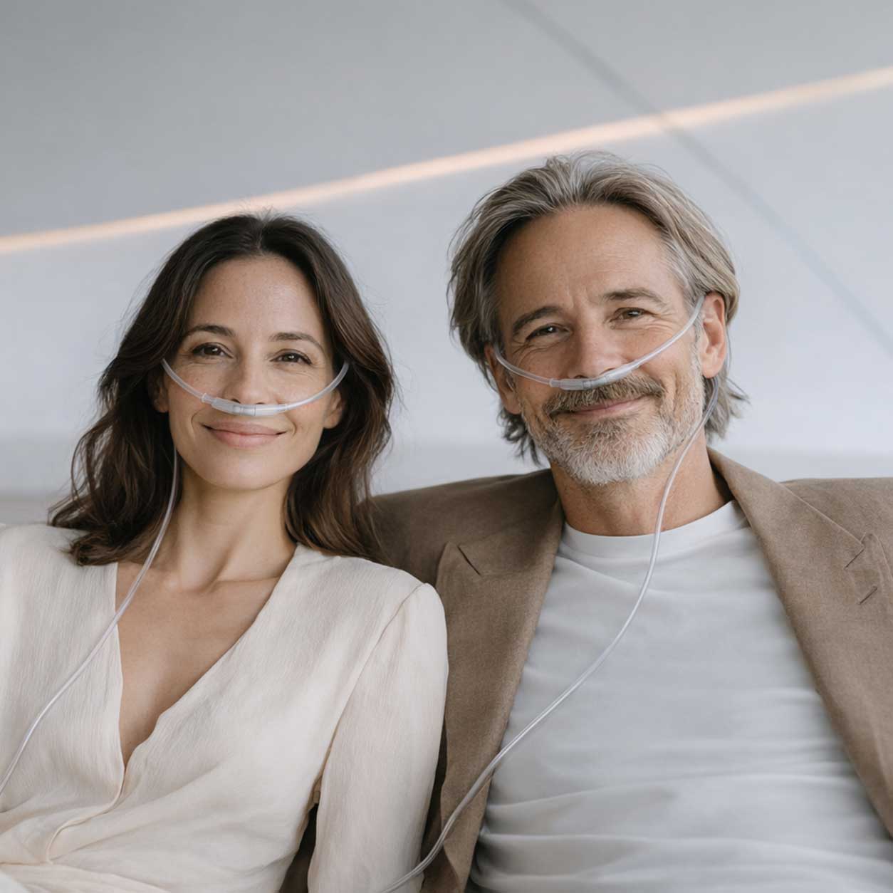 Two people enjoying a molecular hydrogen inhalation session with nasal cannulas